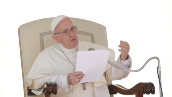 The Latest: US bishops to work with Vatican on abuse