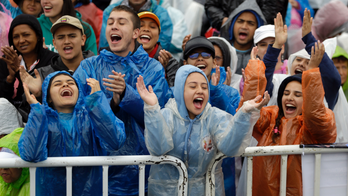 Rains delay pope's arrival in Colombia's second city