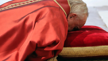 Pope presides over Good Friday amid security, controversy