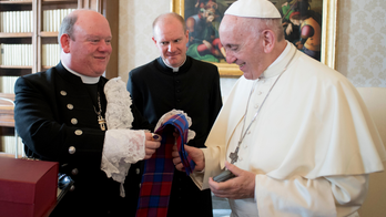 The Latest: Pope speaks with space station astronauts
