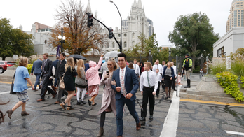 The Latest: Mormon leader denounces racism at conference