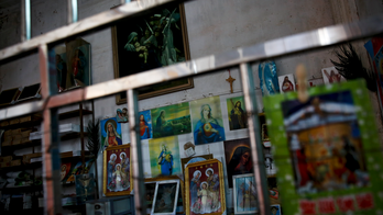 Group: Officials destroying crosses, burning bibles in China