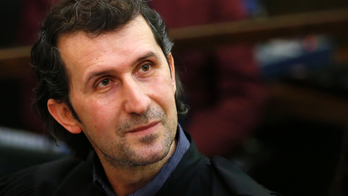 The Latest: Lawyer: Shooting at police criminal, not terror