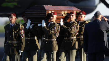 Remains of Czech cardinal return home from Vatican