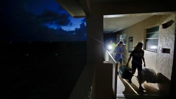 Weakened but dangerous Irma lashes Florida with wind, rain