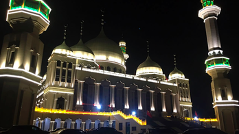 China blames local officials for protest over mosque razing