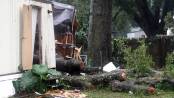 Blamed in baby's death, weakening Gordon spreads rain inland
