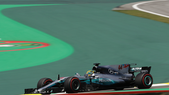 Formula One racer Lewis Hamilton says Mercedes team members robbed at gunpoint