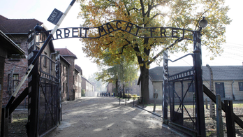 AP Explains: How past wounds fuel debate over Polish law