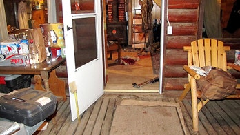 Bloody clothing visible at Oregon cabin where teen killed 2 including foster dad, police say