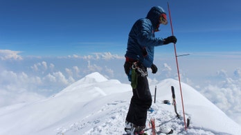 North America's tallest mountain gets new name - and height