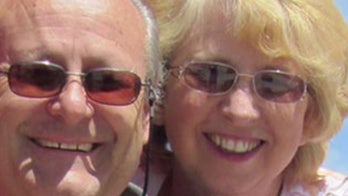 Husband of American Ebola patient cautiously optimistic