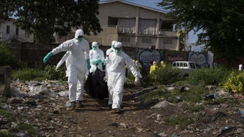 Sierra Leone burial crews reportedly on strike, leaving Ebola victims in the street