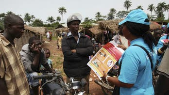 West African churches filled as residents pray for deliverance from 'devil' Ebola