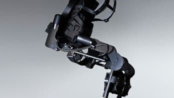 'Walking robot' allows paralyzed man to move again