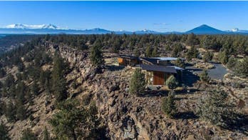 Would You Rather Live in Wayne Manor or a Fortress of Solitude?