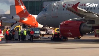 Plane runs over runway worker's foot at Gatwick Airport, passengers say