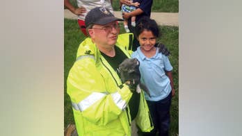 Firefighters were too big, but 6-year-old girl just right to rescue kitten from storm drain