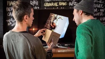 Google Cube is a six-sided psychedelic music video player