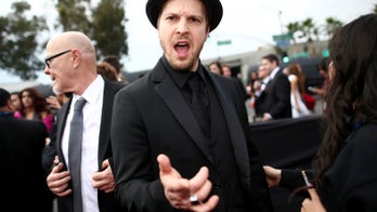 Gavin DeGraw slips, falls after performing national anthem at Stanley Cup playoffs