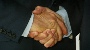 A Strong Handshake Could Mean a Long Life
