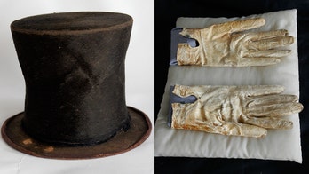 Lincoln's stovepipe hat and bloody gloves may be on the block as foundation struggles with millions in debt