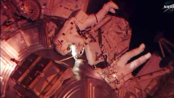 Spacewalking astronauts complete crucial repair job