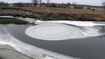 Unusual ice circle forms in North Dakota river