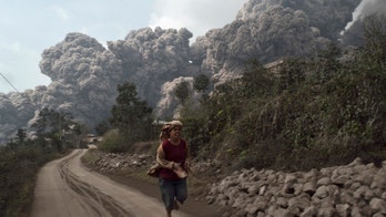 Indonesia volcano erupts again killing at least 16