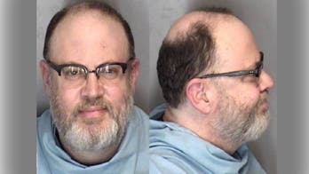 Illinois professor on paid leave amid accusations of filming students in bathroom