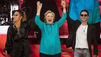 In pictures: Jennifer Lopez, Marc Anthony 'get loud' for Hillary Clinton