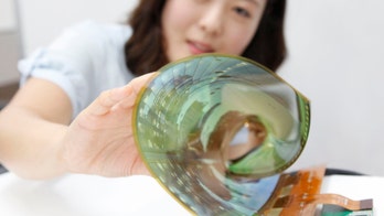 LG Display unveils 18-inch flexible display that can roll like a map