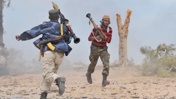 Libyan Fighters Assault Main Qaddafi Base in Sirte