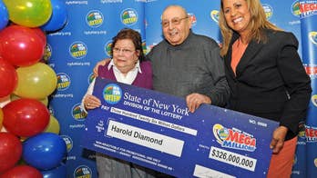 Retired principal is $326 million Mega Millions winner; biggest New York Lottery prize ever