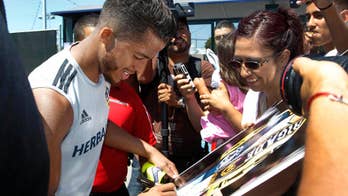 Fans, media line up to greet Mexican standout Giovani dos Santos for practice with LA Galaxy
