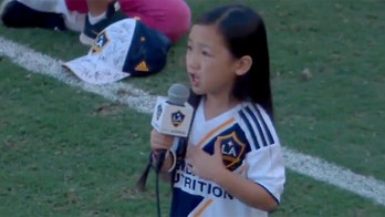 Girl, 7, belts out national anthem at LA Galaxy game in viral video
