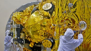 India puts spacecraft into orbit around Mars