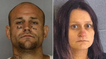 Georgia couple arrested after killing baby and putting body in hotel freezer, police say