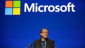 Gates chokes up at Ballmer's final Microsoft shareholders meeting