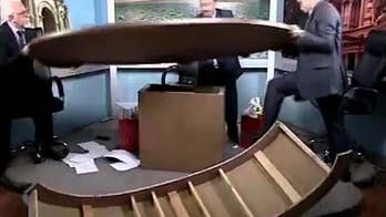 Journalists on live TV talk show in Jordan tear table apart in argument about Syrian civil war