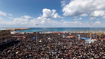 Qaddafi Pushes Ahead With Attacks on Rebels as Arab League Calls for No-Fly Zone