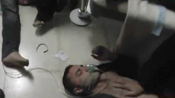 Syria rebels, government trade accusations over poison gas attack