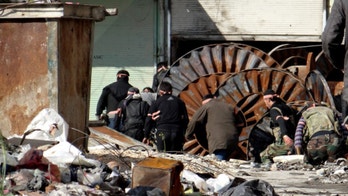 At least 100 dead after 6 days of clashes in Syria, activists say