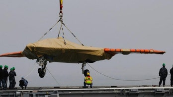 Navy launches unmanned aircraft from carrier for first time