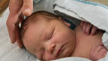 Michigan parents of 13 sons, no daughters, still negotiating name of latest baby