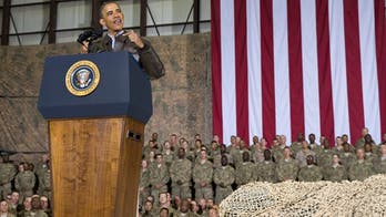 Obama makes surprise trip to Afghanistan, tells troops 'We stand in awe of your service'