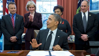 Obama lifts research ban on HIV-positive organ transplants