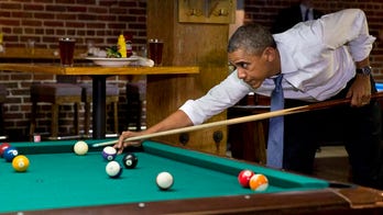 Obama kills time amid border crisis