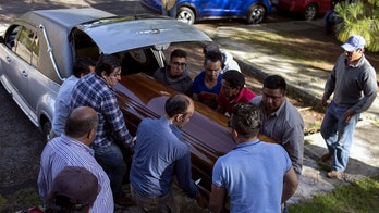 Mexican town's entire police force arrested in connection with mayoral candidate's murder: report