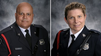 2 Canadian police officers among 4 dead in shooting; 1 suspect in custody